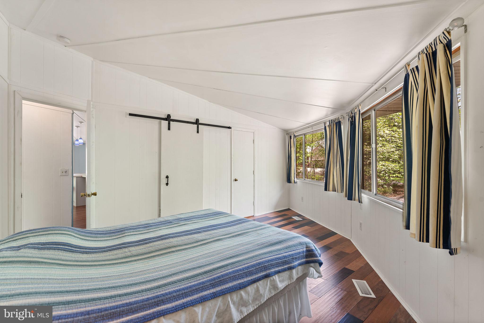 152 Edgemont Circle Locust Grove, VA 22508 - Photo 20 of 60 a bed sitting in a spacious bedroom next to a window