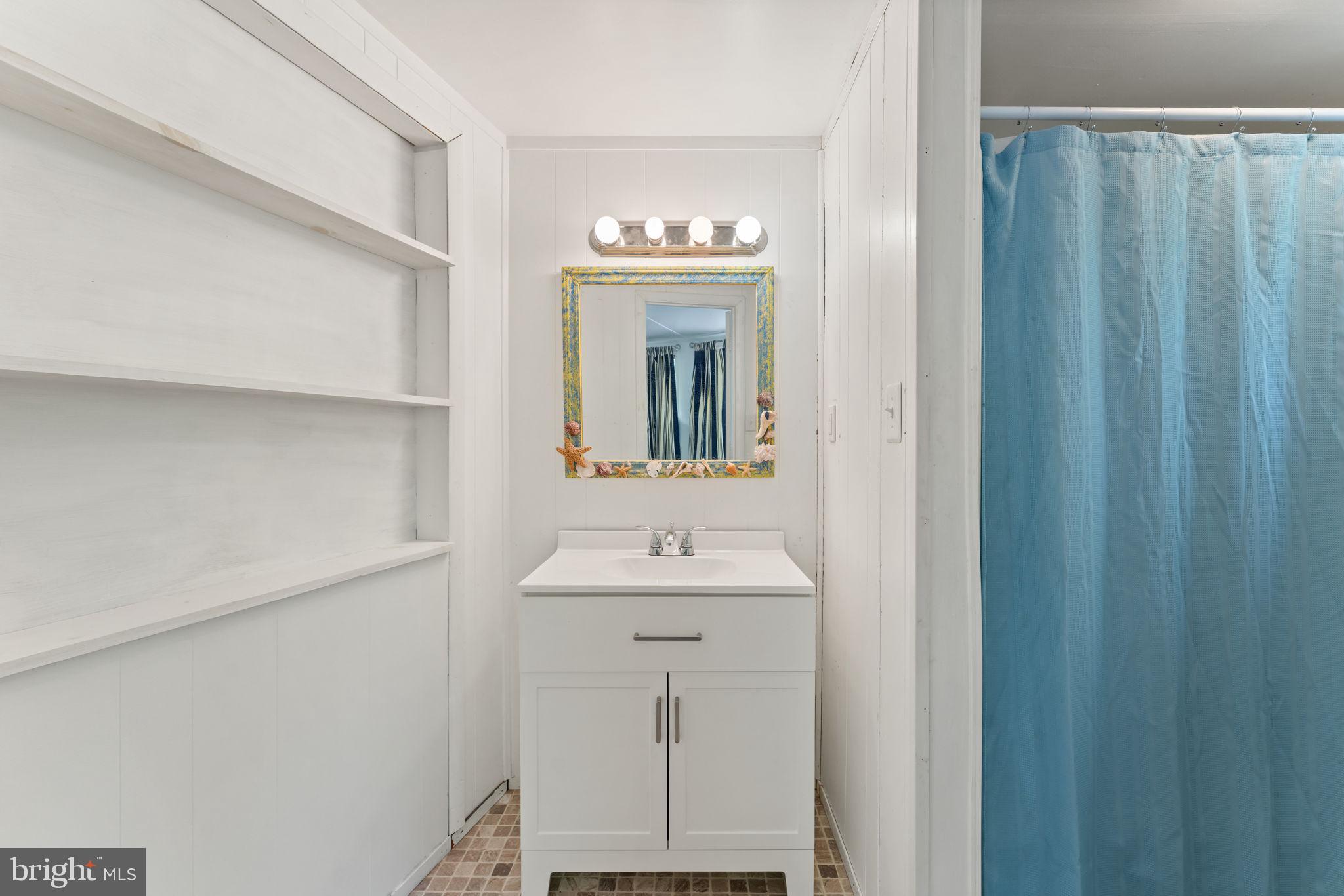 152 Edgemont Circle Locust Grove, VA 22508 - Photo 21 of 60 a bathroom with a sink and a mirror