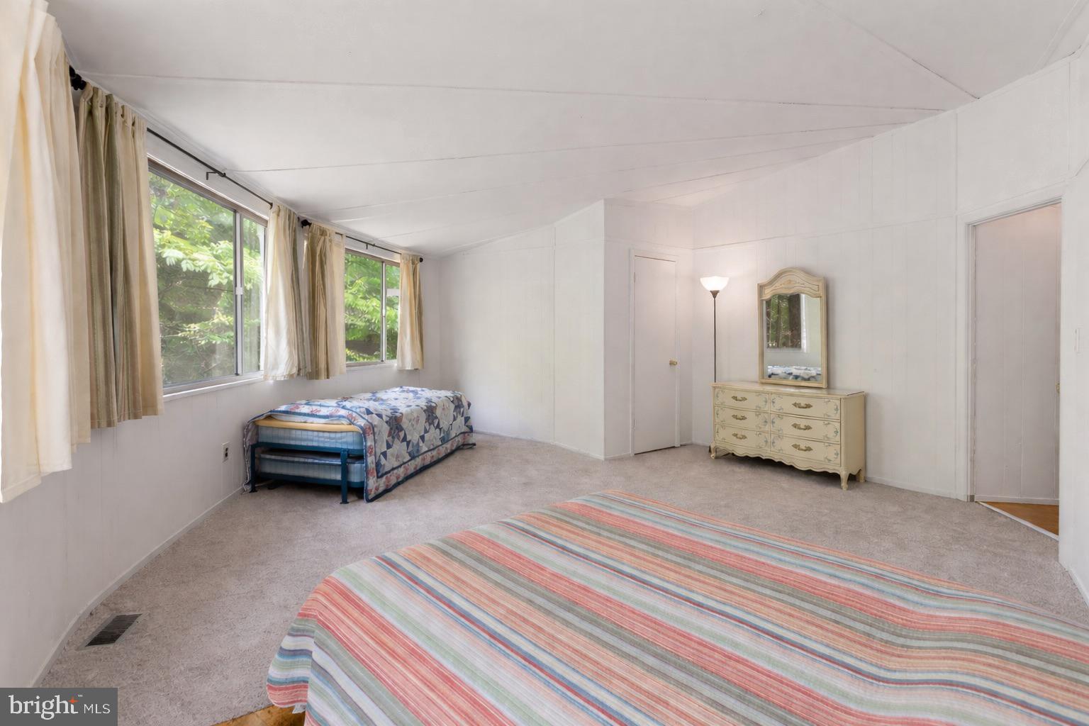 152 Edgemont Circle Locust Grove, VA 22508 - Photo 25 of 60 a bedroom with a bed and a window