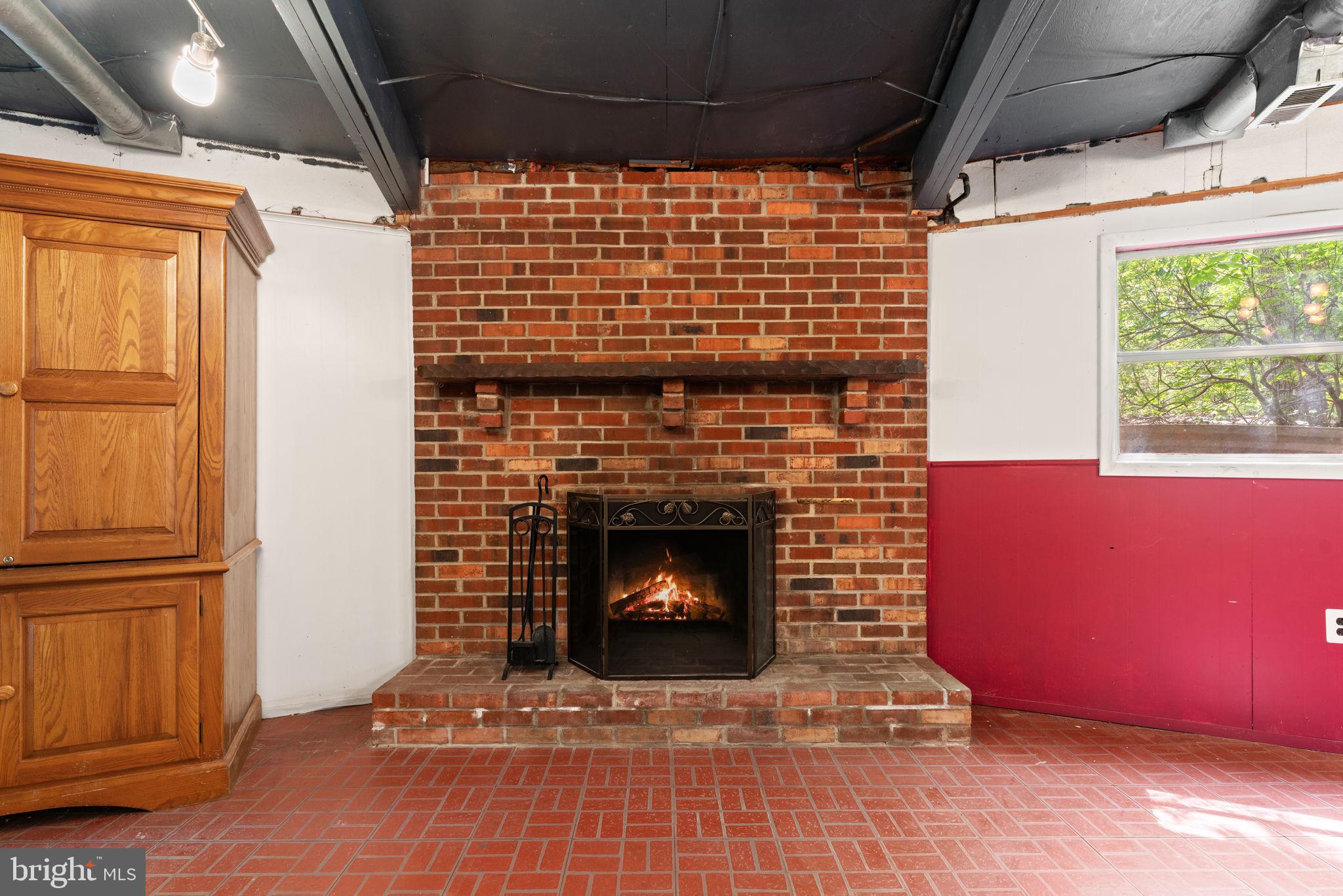 152 Edgemont Circle Locust Grove, VA 22508 - Photo 31 of 60 a living room with a fireplace and a wooden floor