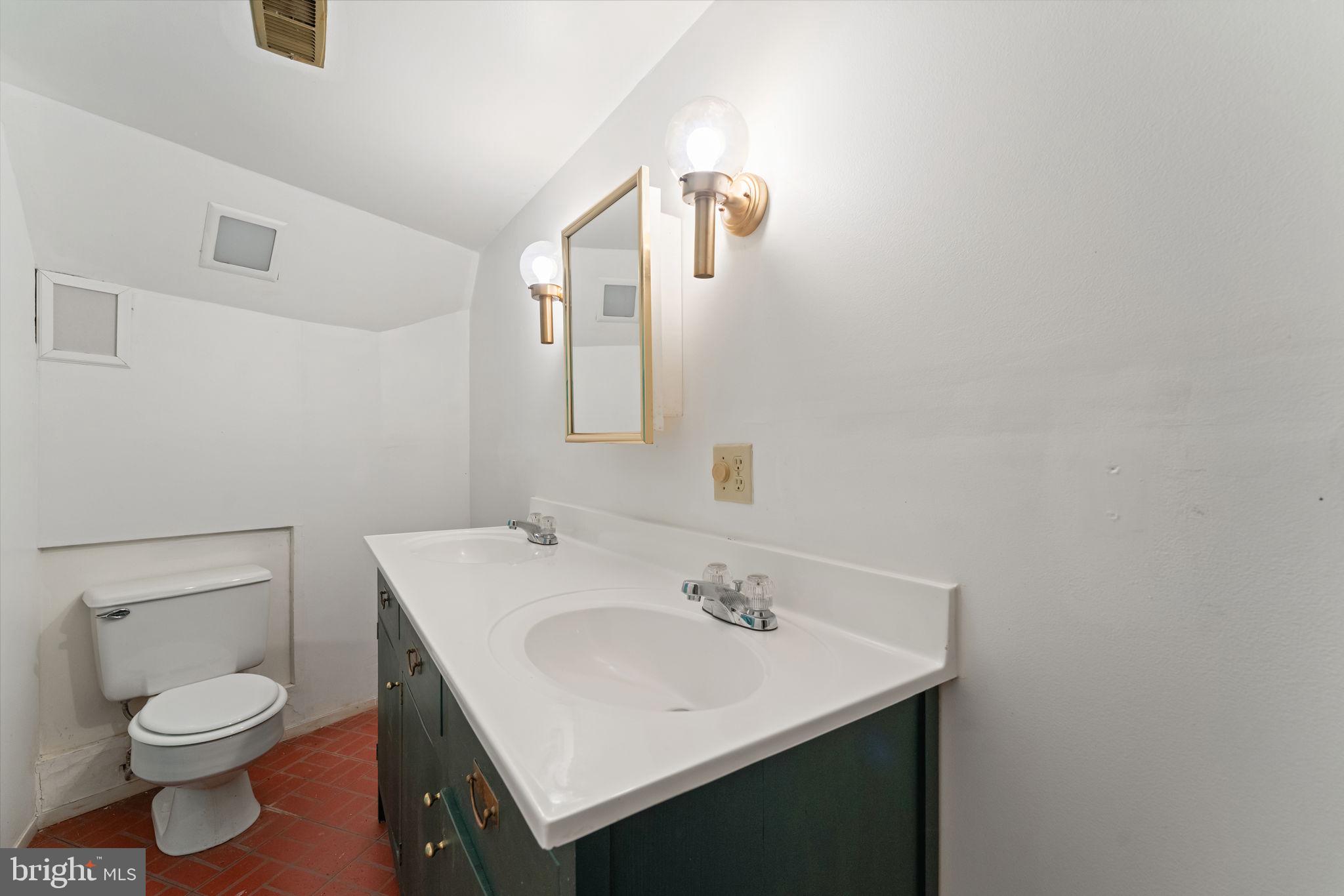 152 Edgemont Circle Locust Grove, VA 22508 - Photo 35 of 60 a bathroom with a sink toilet and mirror