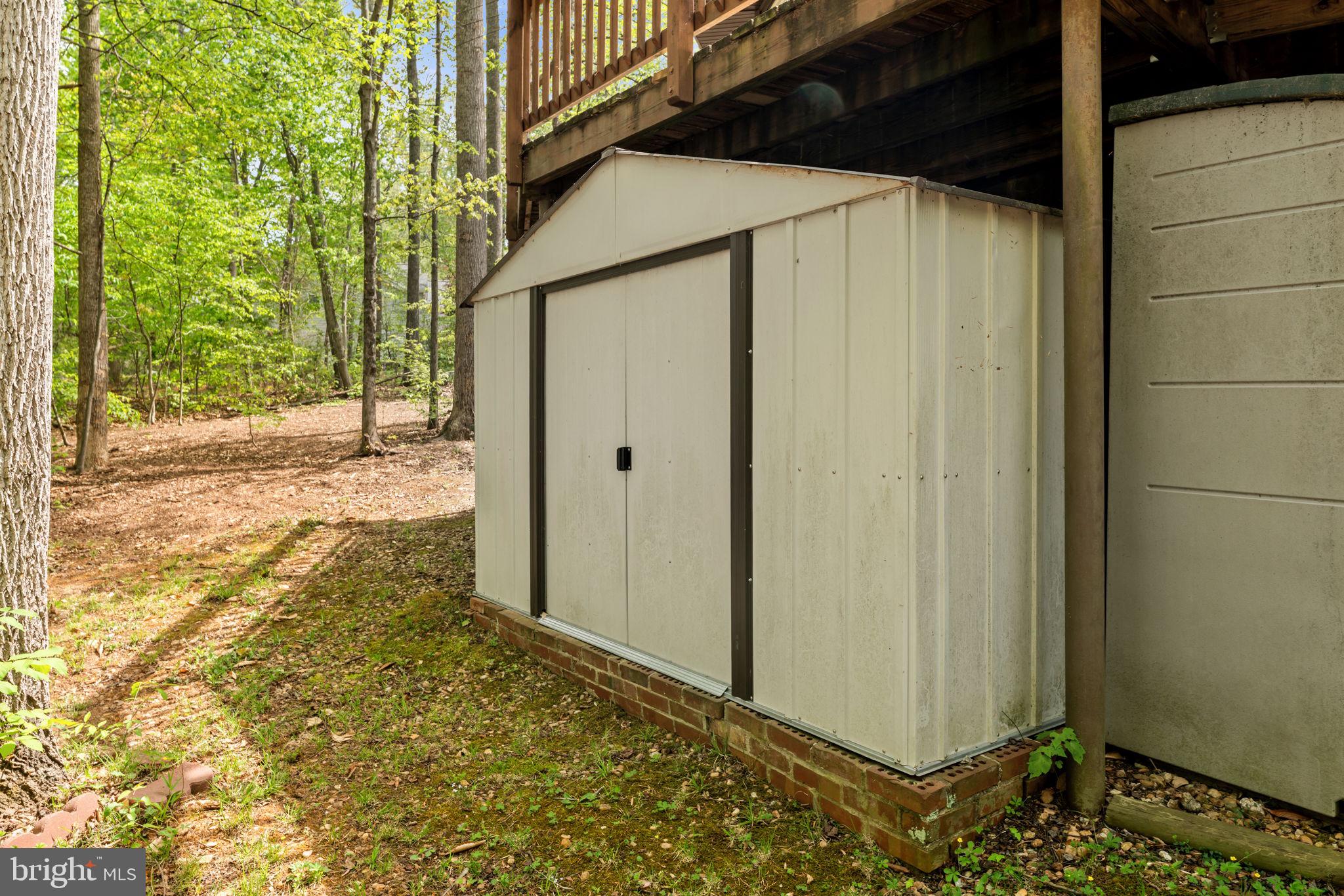 152 Edgemont Circle Locust Grove, VA 22508 - Photo 40 of 60 a view of a back yard from a room