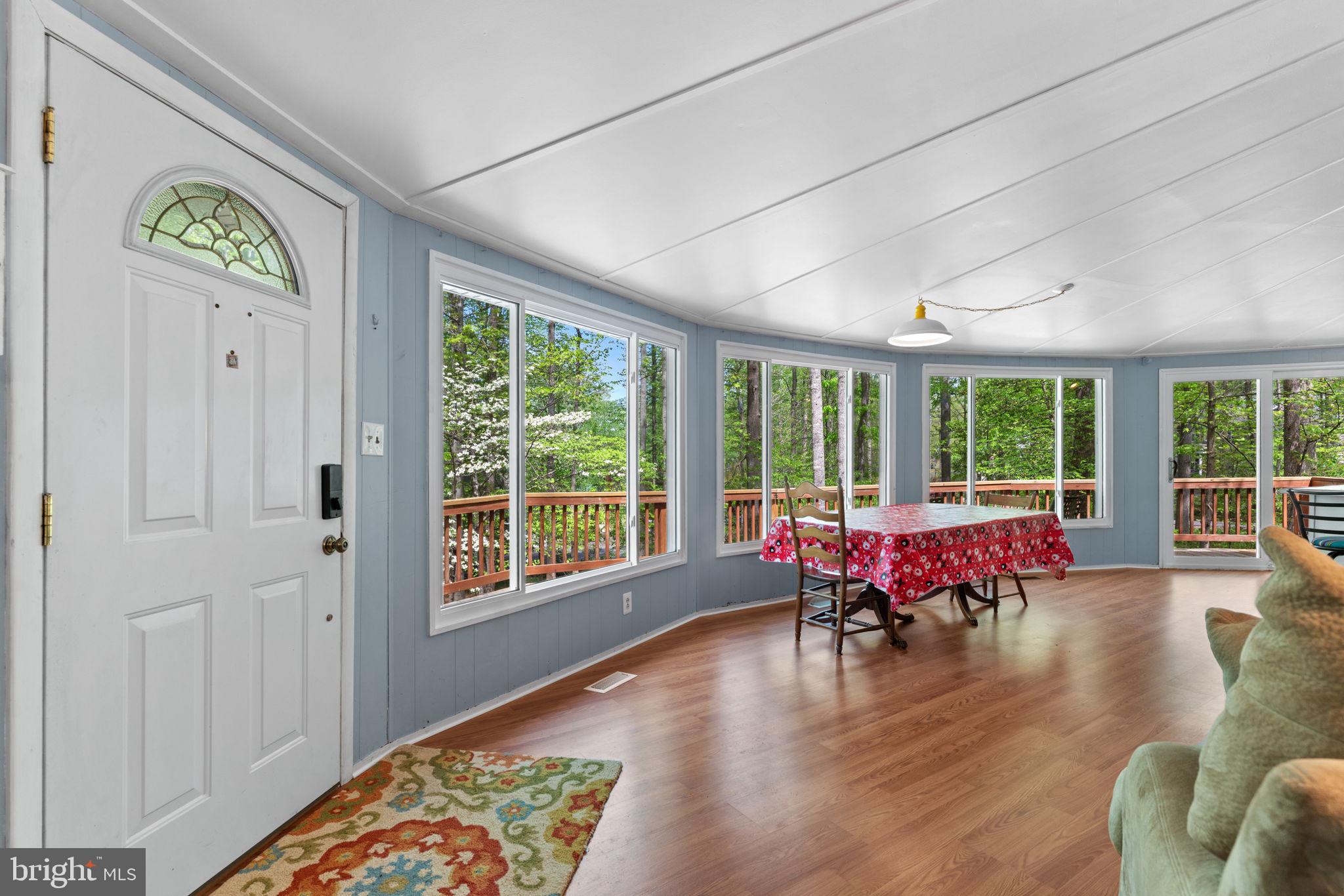 152 Edgemont Circle Locust Grove, VA 22508 - Photo 9 of 60 a view of a livingroom with furniture window and outside view
