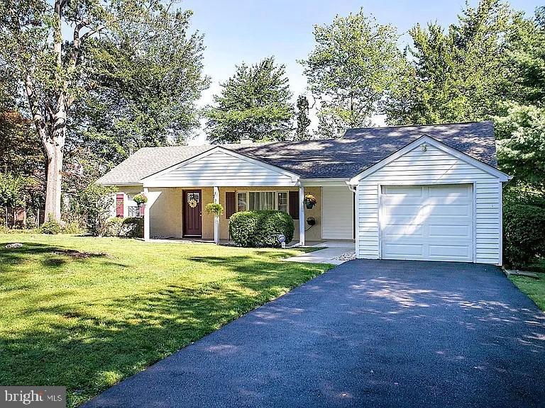 336 Hillside Road King of Prussia, PA 19406 - Photo 1 of 17 a front view of a house with a garden