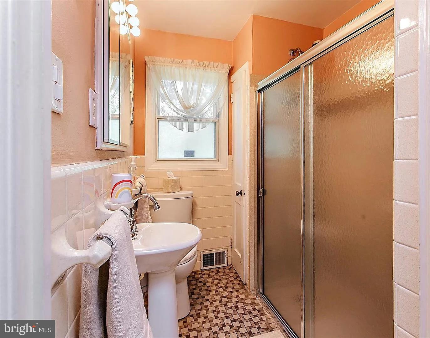 336 Hillside Road King of Prussia, PA 19406 - Photo 13 of 17 a bathroom with a sink and a mirror
