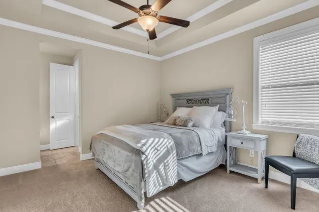 a room with furniture and a chandelier