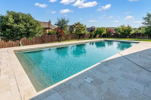 a view of a house with swimming pool