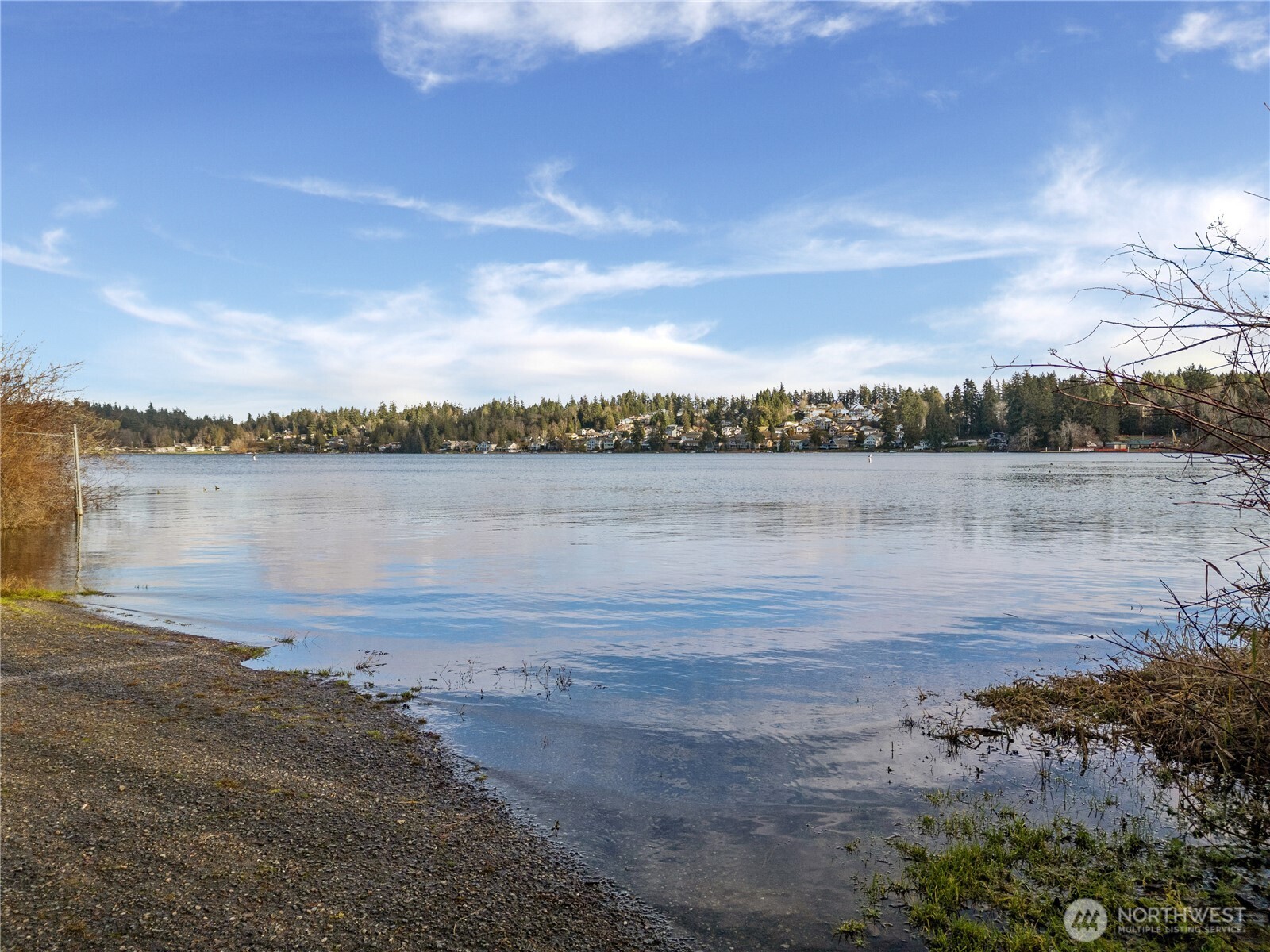 1843 Kitsap Lake Road Northwest Bremerton, WA 98312 - Photo 14 of 16 a view of a lake with houses in the back