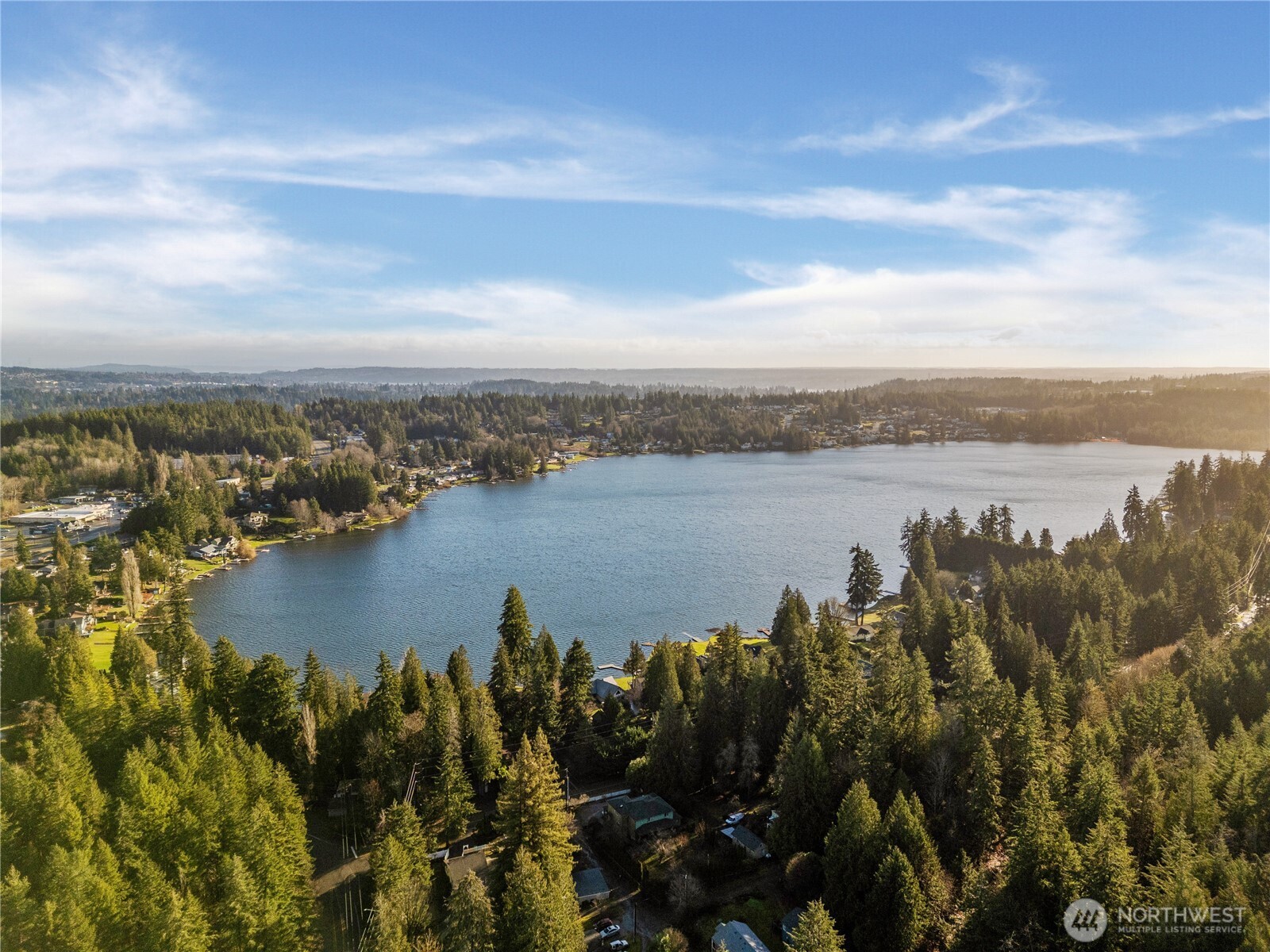 1843 Kitsap Lake Road Northwest Bremerton, WA 98312 - Photo 15 of 16 a view of a lake with a city