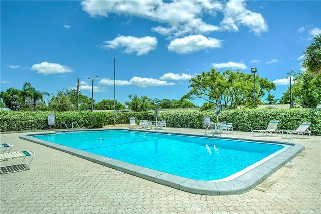 a view of a swimming pool and outdoor space