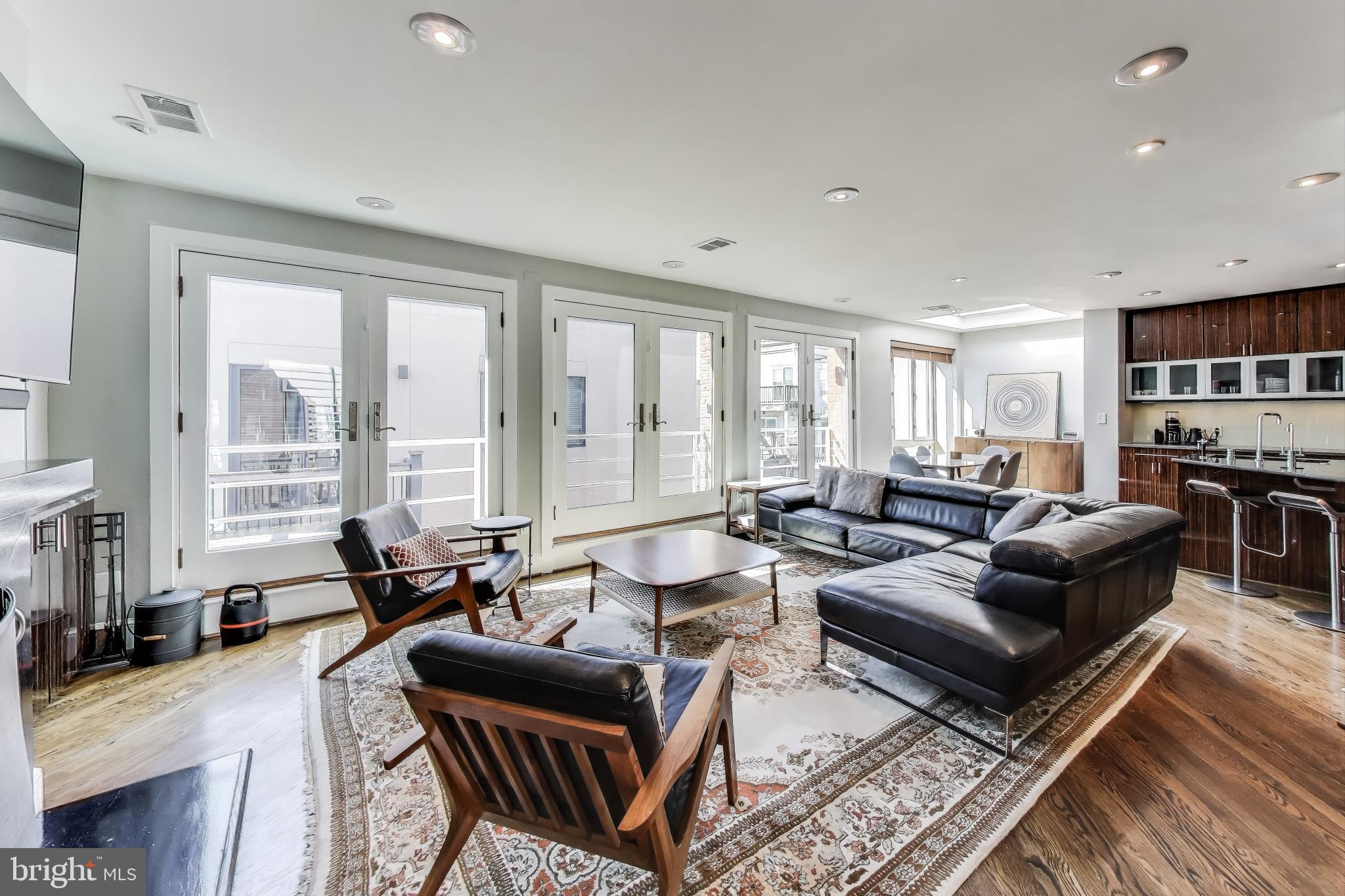 2370 Champlain Street Northwest, Unit 34 Washington, DC 20009 - Photo 2 of 45 Wall of French doors that open to Juliet balcony