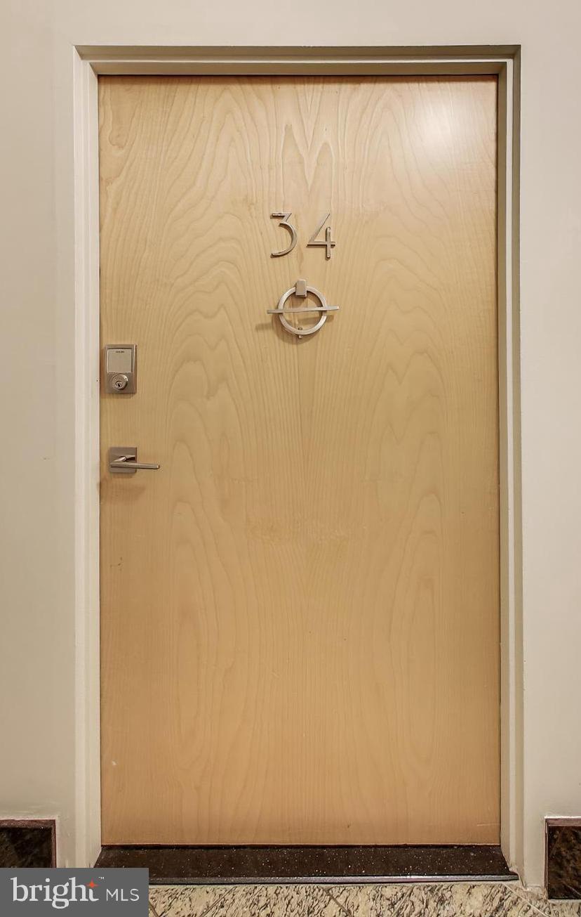 2370 Champlain Street Northwest, Unit 34 Washington, DC 20009 - Photo 24 of 45 Welcoming, well lit hallways