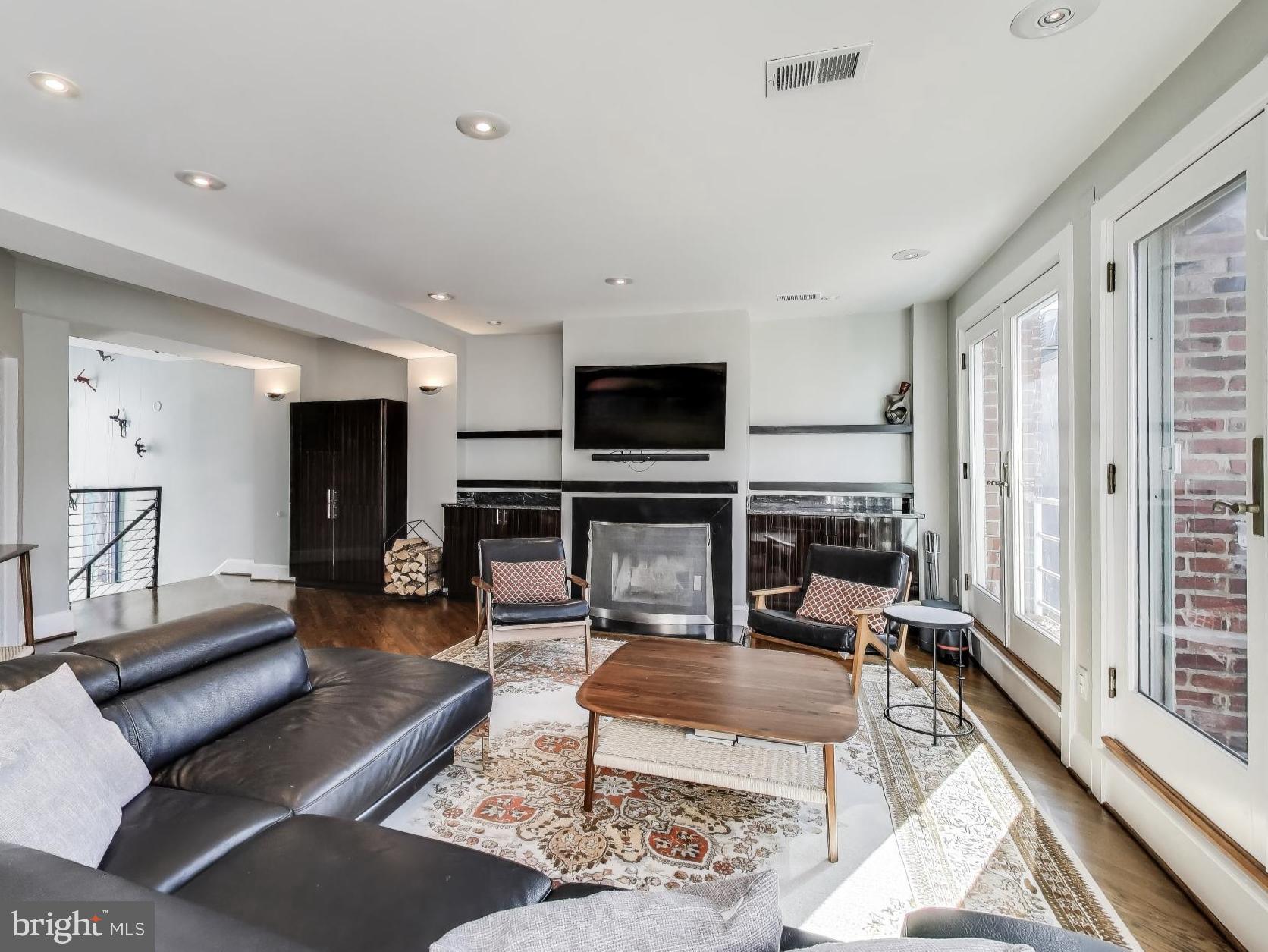 2370 Champlain Street Northwest, Unit 34 Washington, DC 20009 - Photo 3 of 45 Wood burning fireplace and room to host