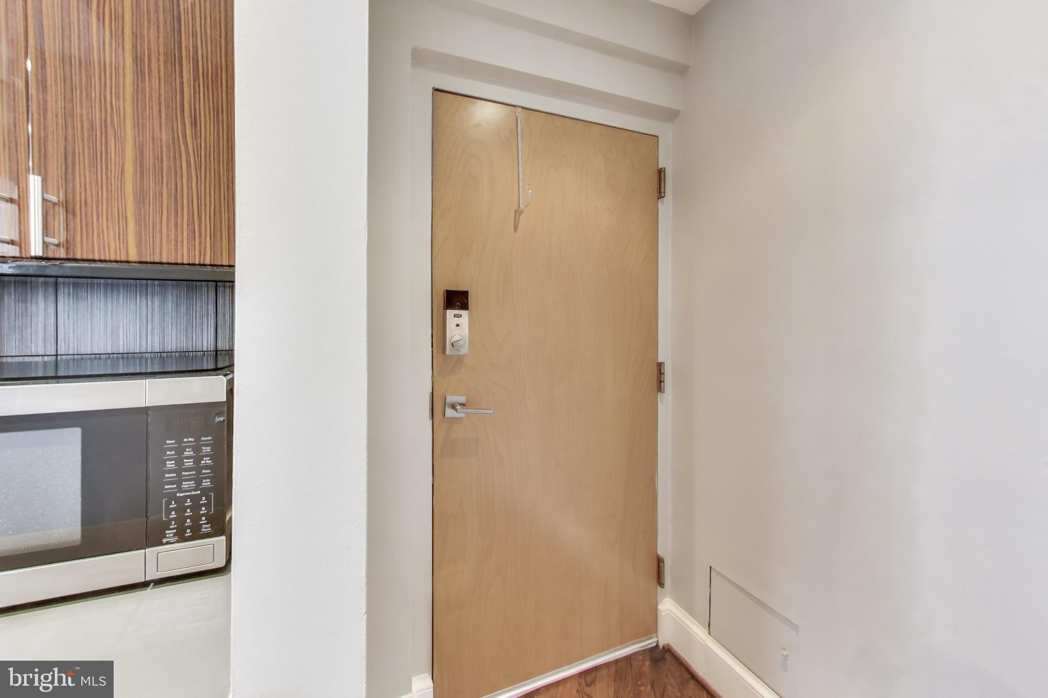 2370 Champlain Street Northwest, Unit 34 Washington, DC 20009 - Photo 9 of 45 Upper level 2nd entrance leads straight to garage