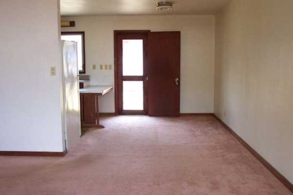 3369 Puni Road Koloa, HI 96756 - Photo 4 of 11 a view of empty room with windows and bathroom