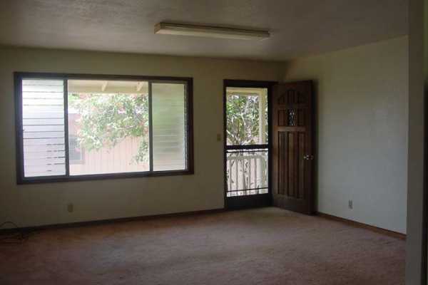 3369 Puni Road Koloa, HI 96756 - Photo 5 of 11 an empty room with a window