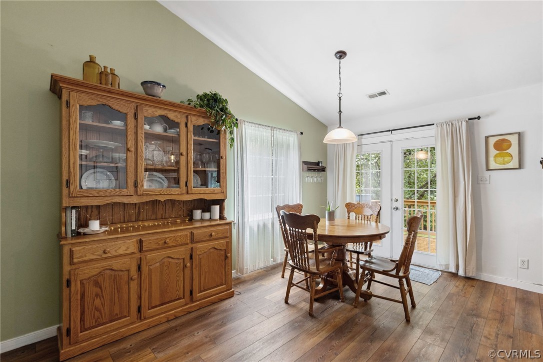 317 South Ridge Road Bumpass, VA 23024 - Photo 11 of 36 a view of a dining room with furniture window and wooden floor