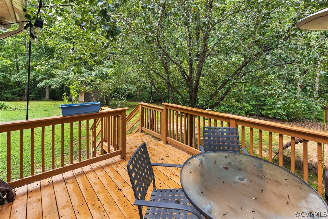 317 South Ridge Road Bumpass, VA 23024 - Photo 24 of 36 a view of balcony with wooden floor and fence
