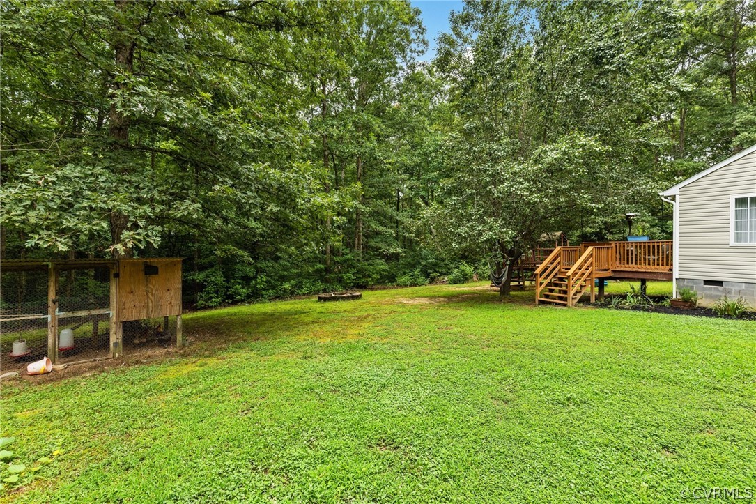 317 South Ridge Road Bumpass, VA 23024 - Photo 26 of 36 a view of a house with a backyard