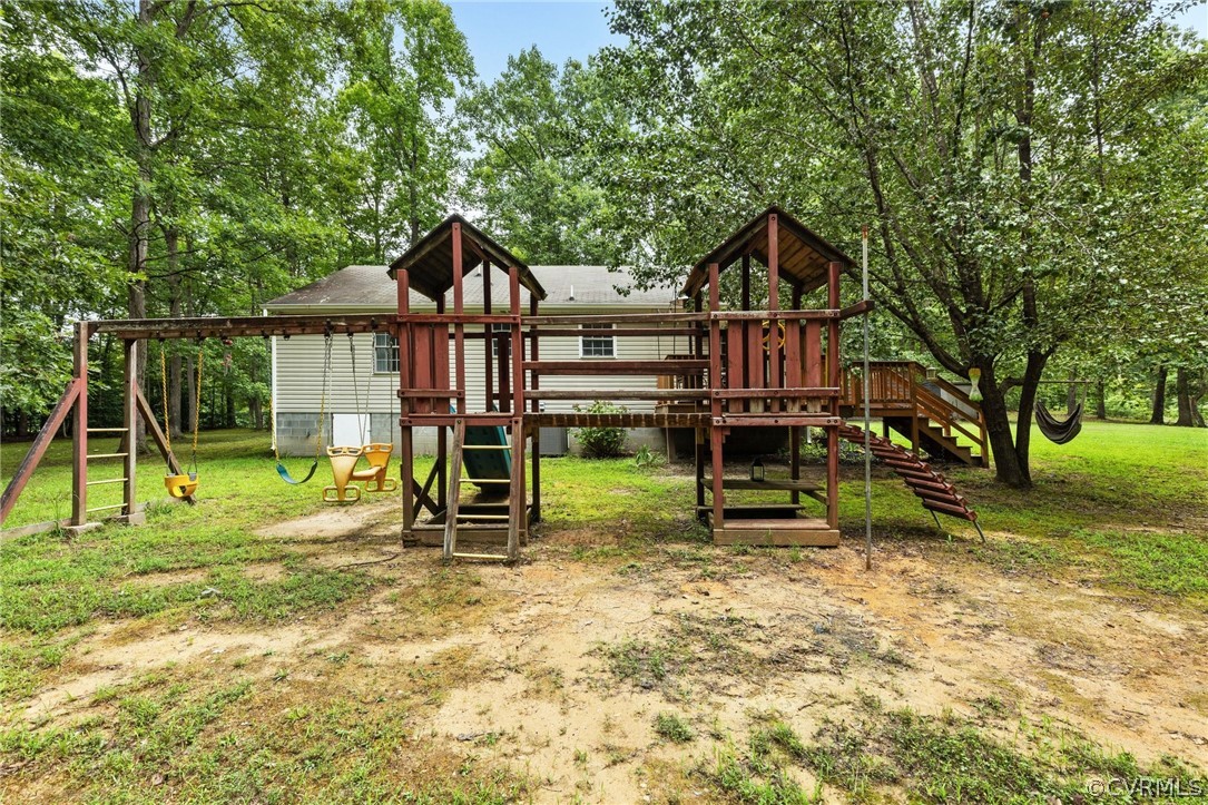 317 South Ridge Road Bumpass, VA 23024 - Photo 28 of 36 a view of a house with backyard and a slide
