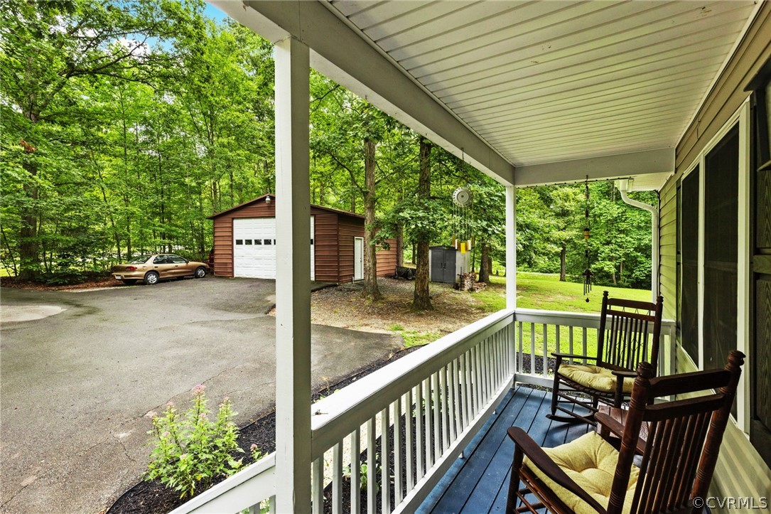 317 South Ridge Road Bumpass, VA 23024 - Photo 5 of 36 a view of a porch with furniture and garden
