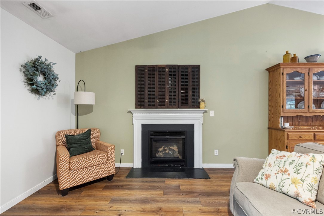 317 South Ridge Road Bumpass, VA 23024 - Photo 9 of 36 a living room with furniture and a fireplace