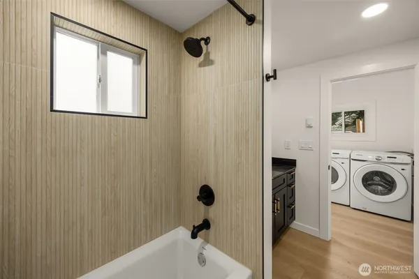 a utility room with dryer and washer