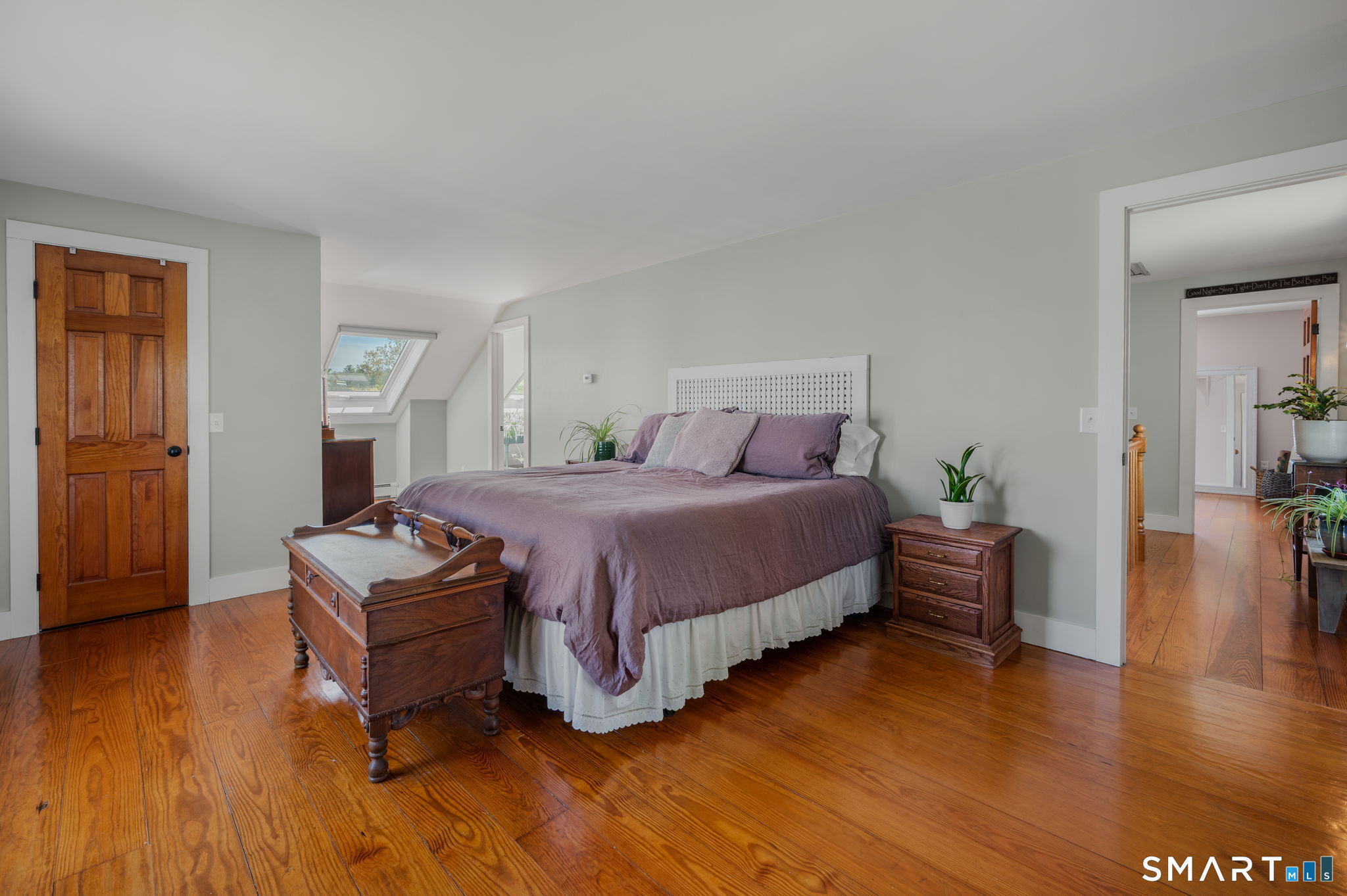 21 Hefflon Farm Road Old Lyme, CT 06371 - Photo 19 of 40 Primary bedroom suite features skylight and wood floors