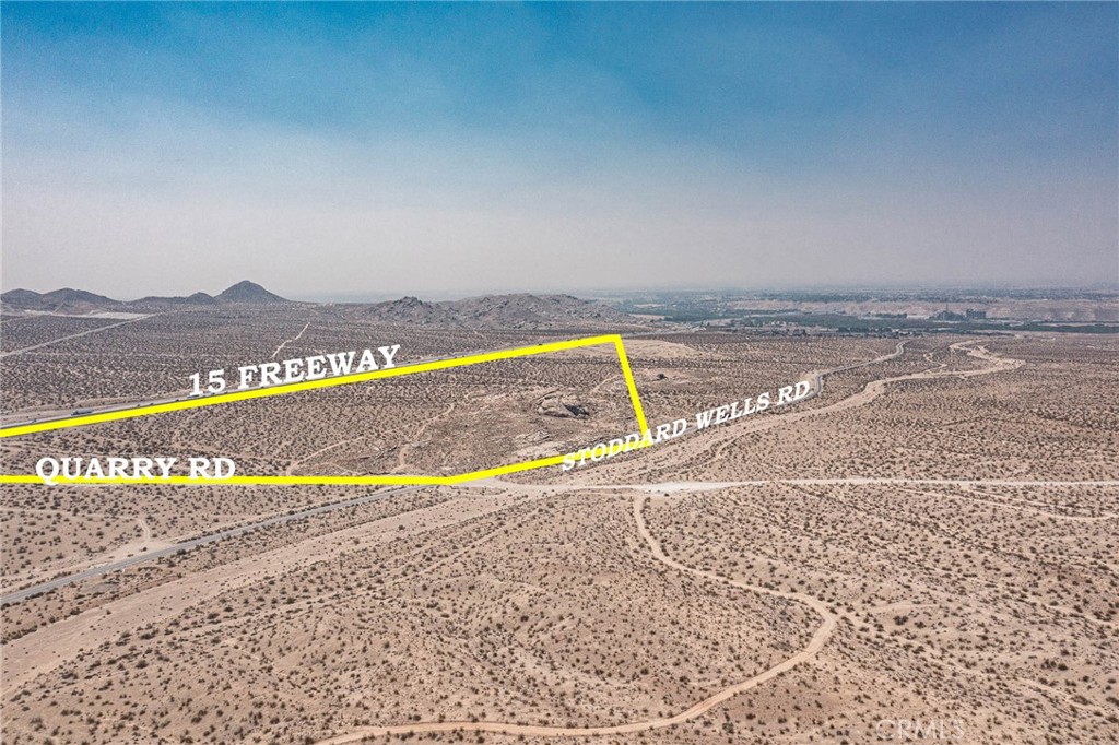 0 Stoddard Wells Road Victorville, CA 92394 - Photo 5 of 8 a view of a swimming pool and an outdoor space