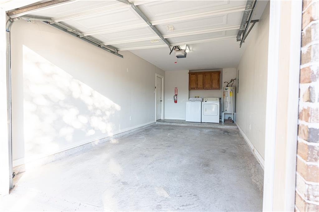 616 Jade Street Edinburg, TX 78541 - Photo 14 of 17 a view of a hallway with a white walls
