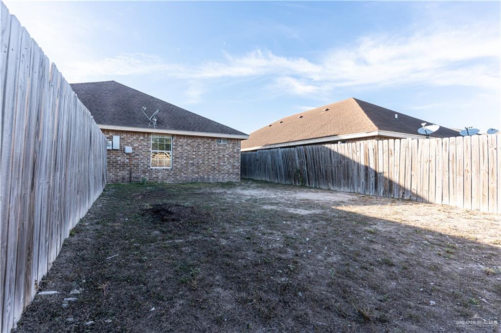 616 Jade Street Edinburg, TX 78541 - Photo 16 of 17 a view of a house with wooden fence