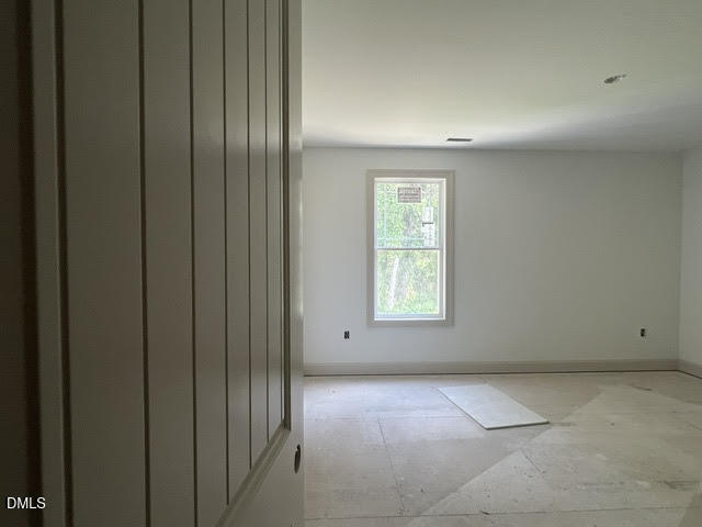 119 Big Pine Road Clayton, NC 27520 - Photo 15 of 21 a view of an empty room with a window