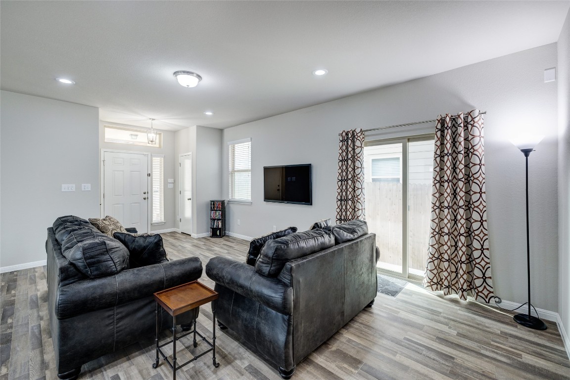 128 Shearwater Lane Leander, TX 78641 - Photo 12 of 30 a living room with furniture and a flat screen tv