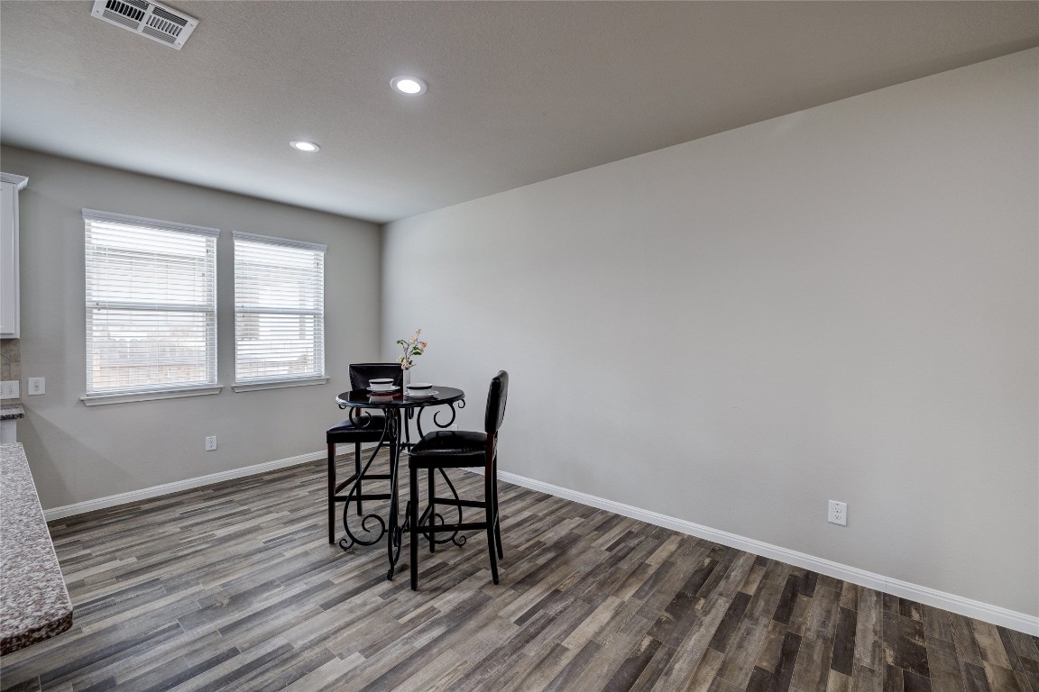 128 Shearwater Lane Leander, TX 78641 - Photo 18 of 30 a workspace room with furniture and wooden floor