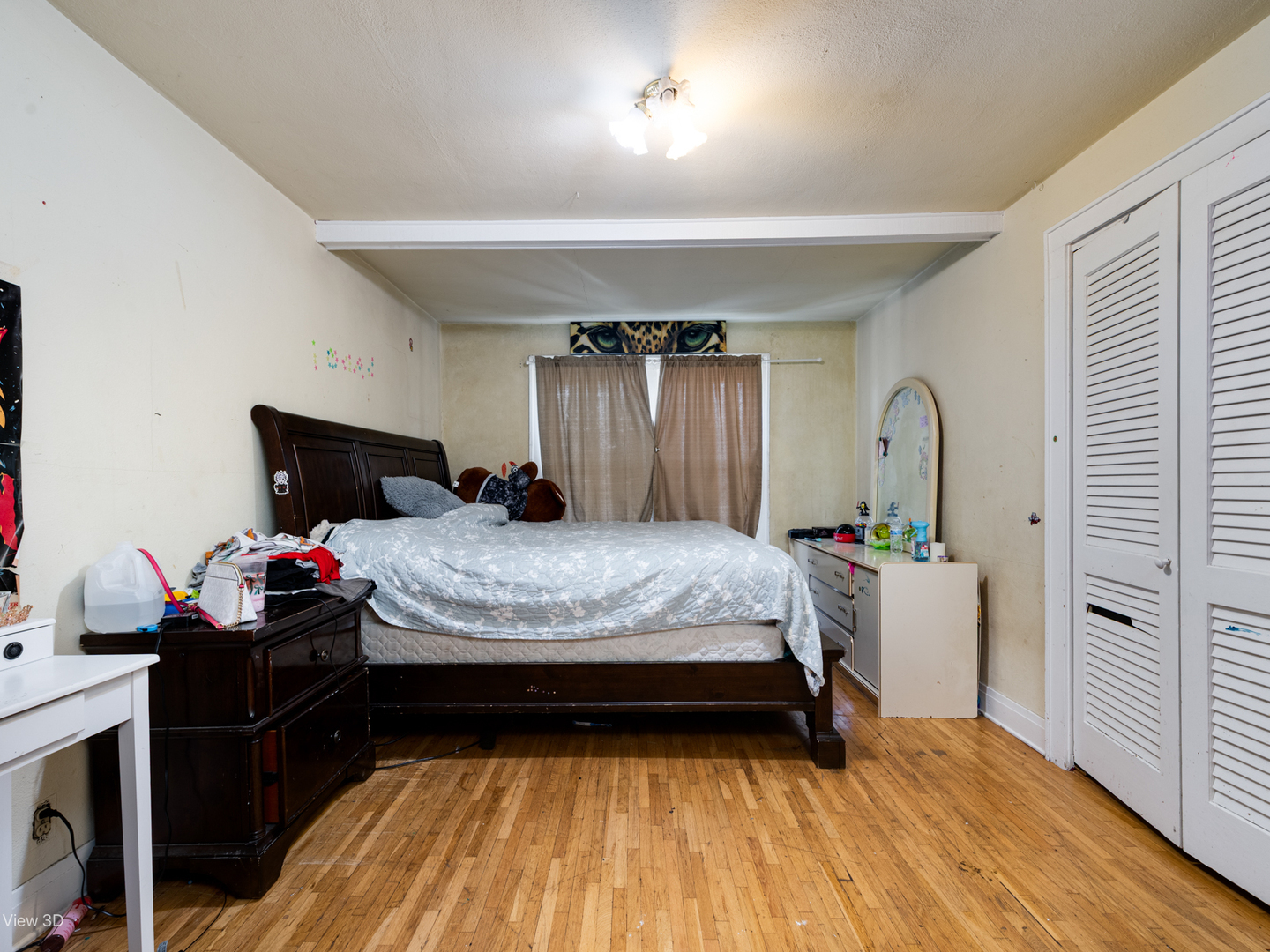 1020 Black Road Joliet, IL 60435 - Photo 11 of 18 a bedroom with a bed and wooden floor