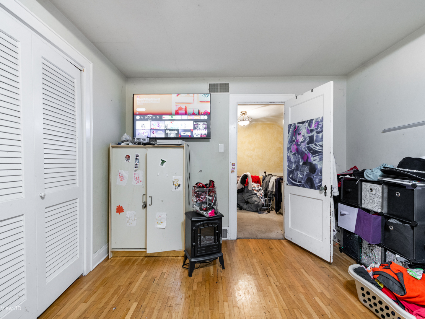 1020 Black Road Joliet, IL 60435 - Photo 12 of 18 a living room with furniture and a flat screen tv