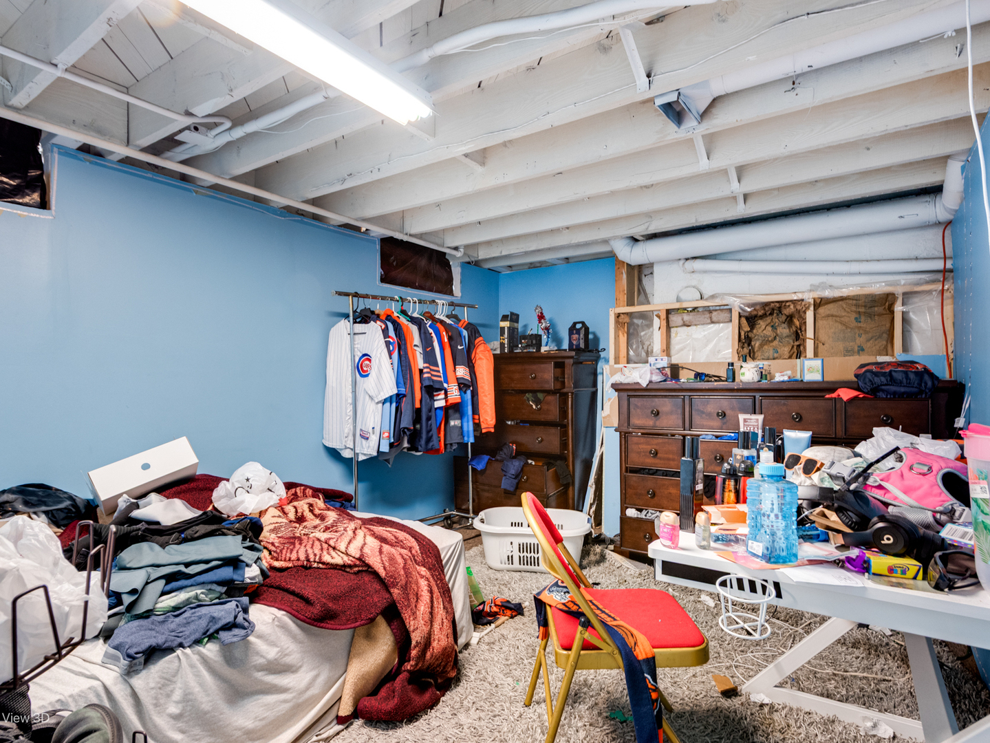 1020 Black Road Joliet, IL 60435 - Photo 17 of 18 a bed room with a bed and a store