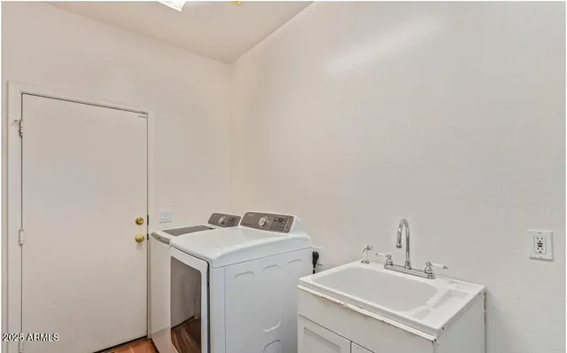 a living room with furniture gym equipment and a flat screen tv