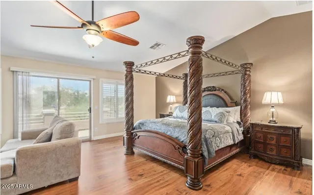 a living room with furniture a window and a fireplace