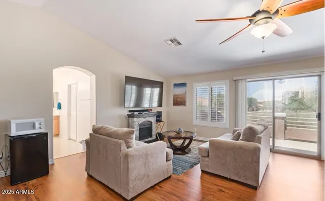 a bathroom with a double vanity sink mirror and shower
