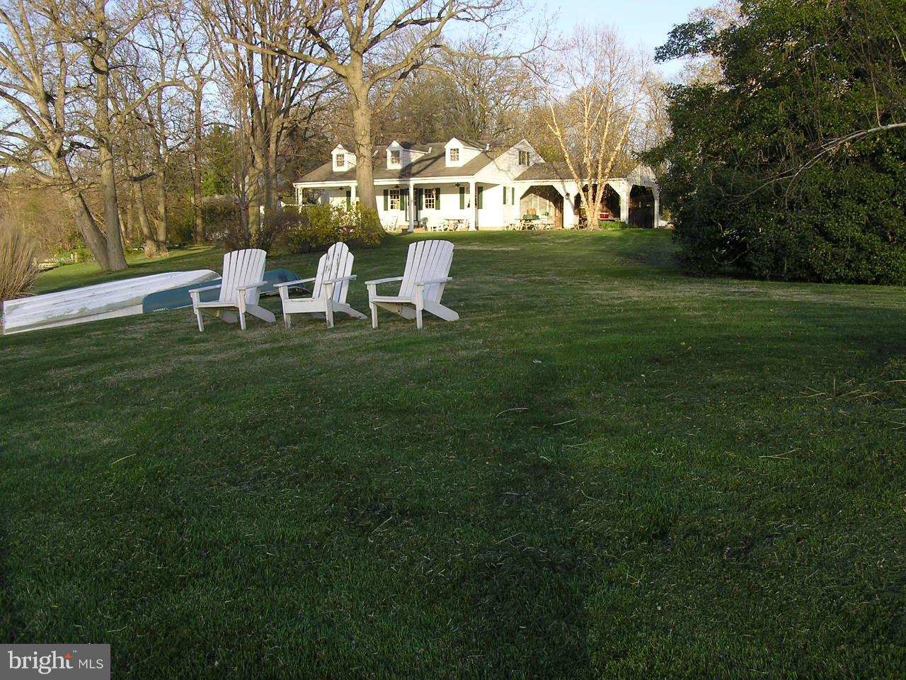 1532 Denton Road Baltimore, MD 21221 - Photo 5 of 22 a front view of a house with a garden