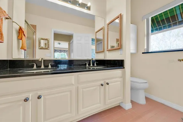 a bathroom with a sink and a toilet