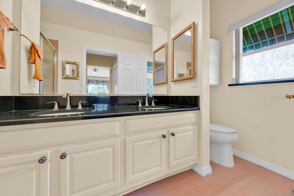 802 Miranda Way The Villages, FL 32159 - Photo 15 of 29 a bathroom with a sink and a toilet