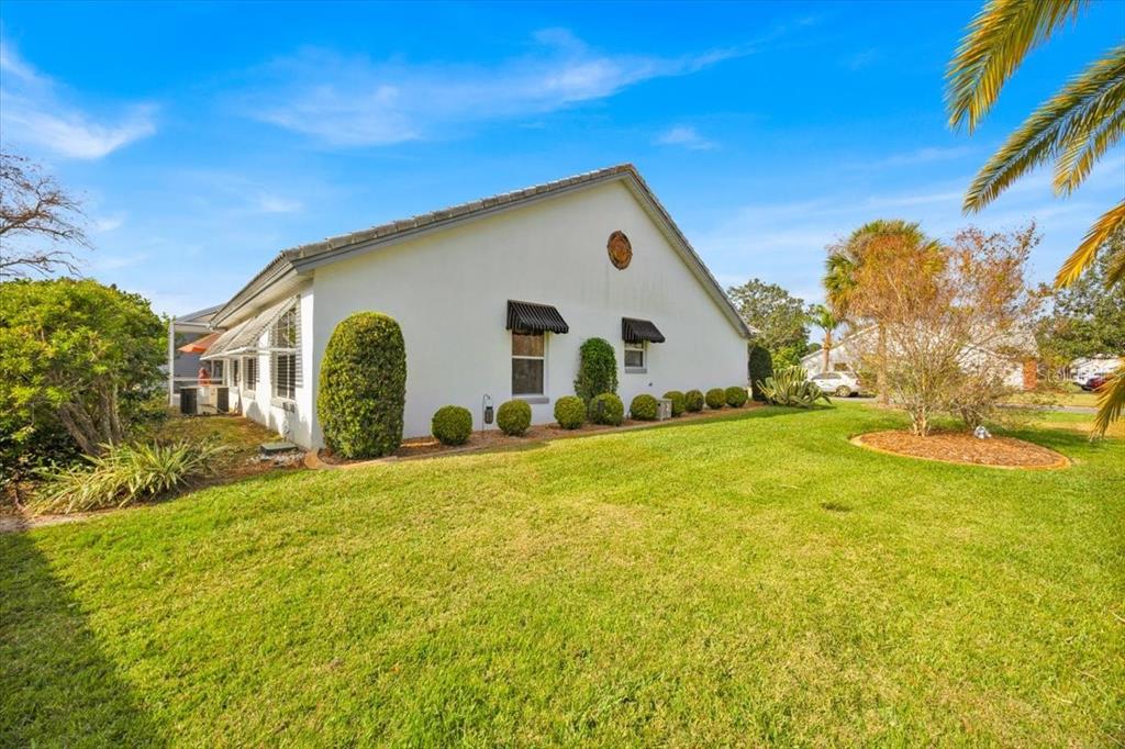 802 Miranda Way The Villages, FL 32159 - Photo 23 of 29 a view of a house with a yard