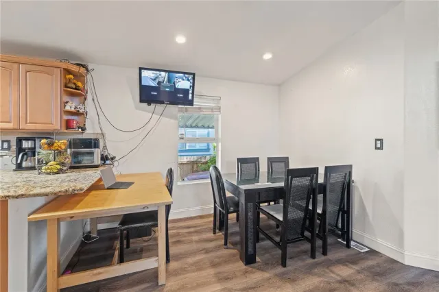 a view of a dining room with furniture