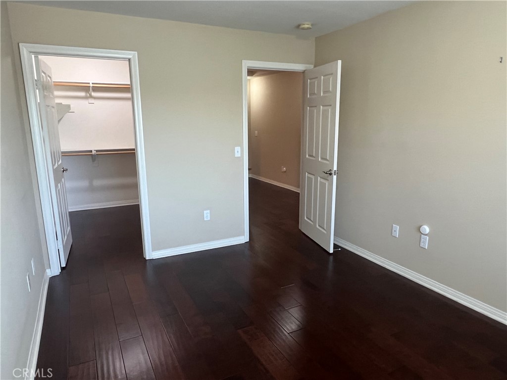 1510 Orange Avenue, Unit 902 Redlands, CA 92373 - Photo 14 of 29 an empty room with wooden floor & closet area