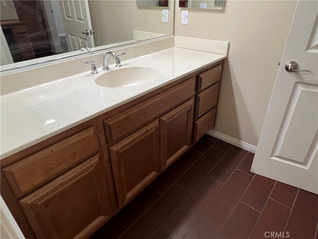1510 Orange Avenue, Unit 902 Redlands, CA 92373 - Photo 17 of 29 a bathroom with a sink and a mirror
