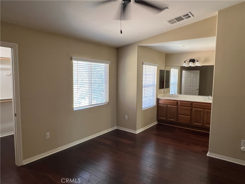 1510 Orange Avenue, Unit 902 Redlands, CA 92373 - Photo 21 of 29 a view of a kitchen with a sink and dishwasher wooden floor