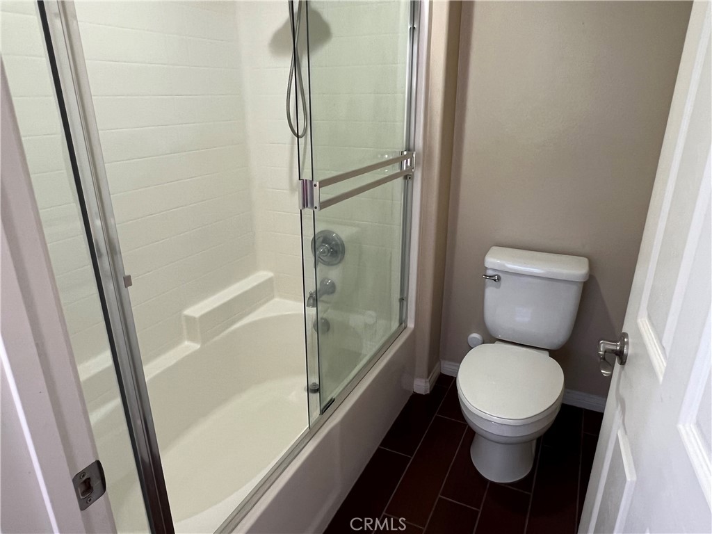 1510 Orange Avenue, Unit 902 Redlands, CA 92373 - Photo 24 of 29 a white toilet sitting next to a shower