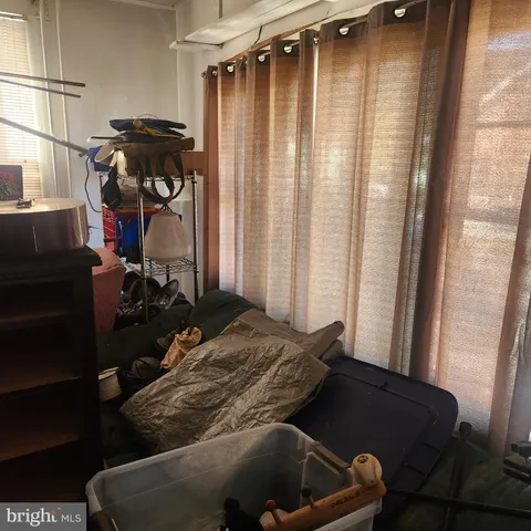 a view of a workspace with furniture